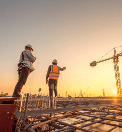 Two men working together at a construction site