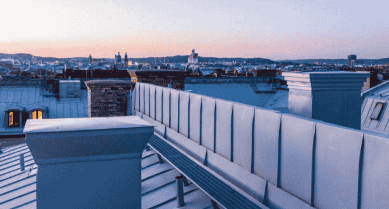 Modern rooftop parapet wall with clean design, protective railing, and durable exterior construction structure