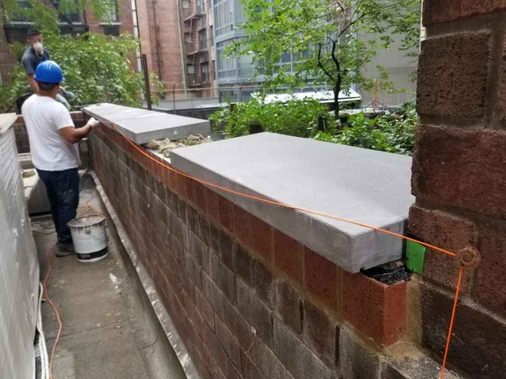 Masonry restoration and brick wall repair project completed by NuEra Contracting in NYC