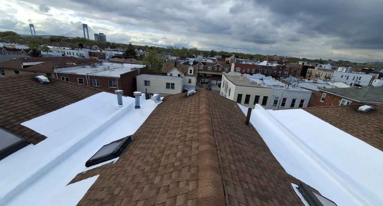 Professional shingle roof repair completed on a residential asphalt roof